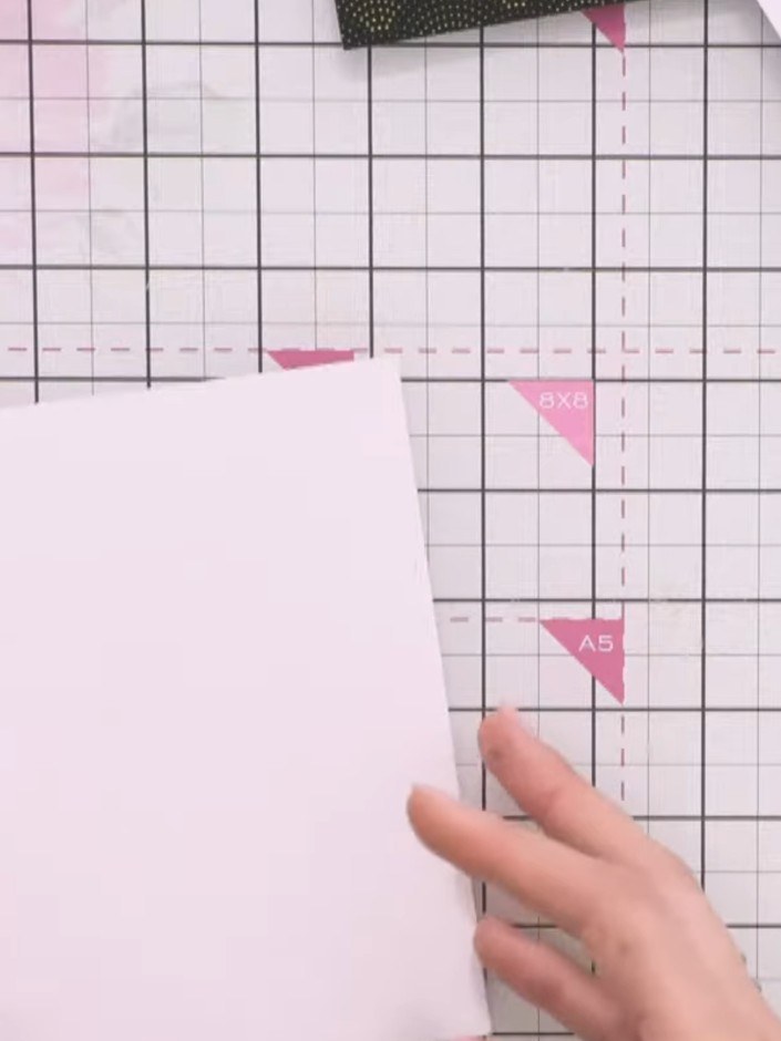 Step 1: Cut your white card to size and trim it to the desired dimensions using a cutting mat and ruler. Position the 