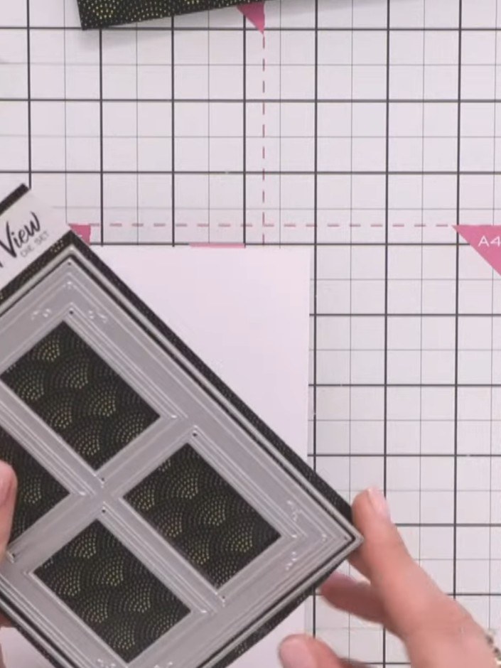 Step 2: Run the four-panel window die through your die-cutting machine to cut the window frame from your card. Positio