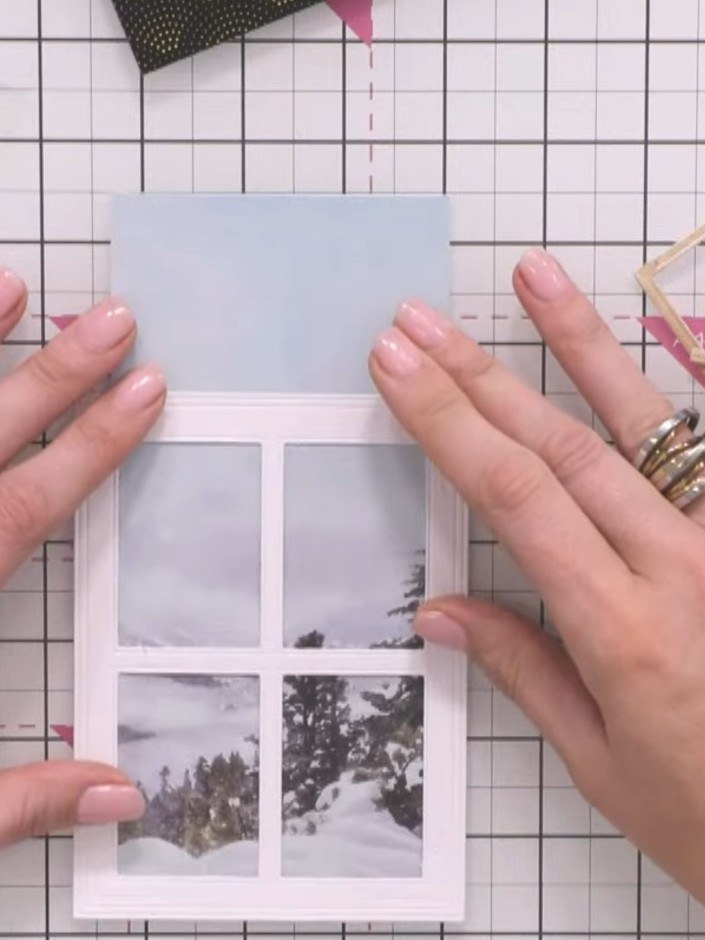 Step 6: Position the coloured shadow pieces back into the window frame. Ensure all pieces face the same direction to c