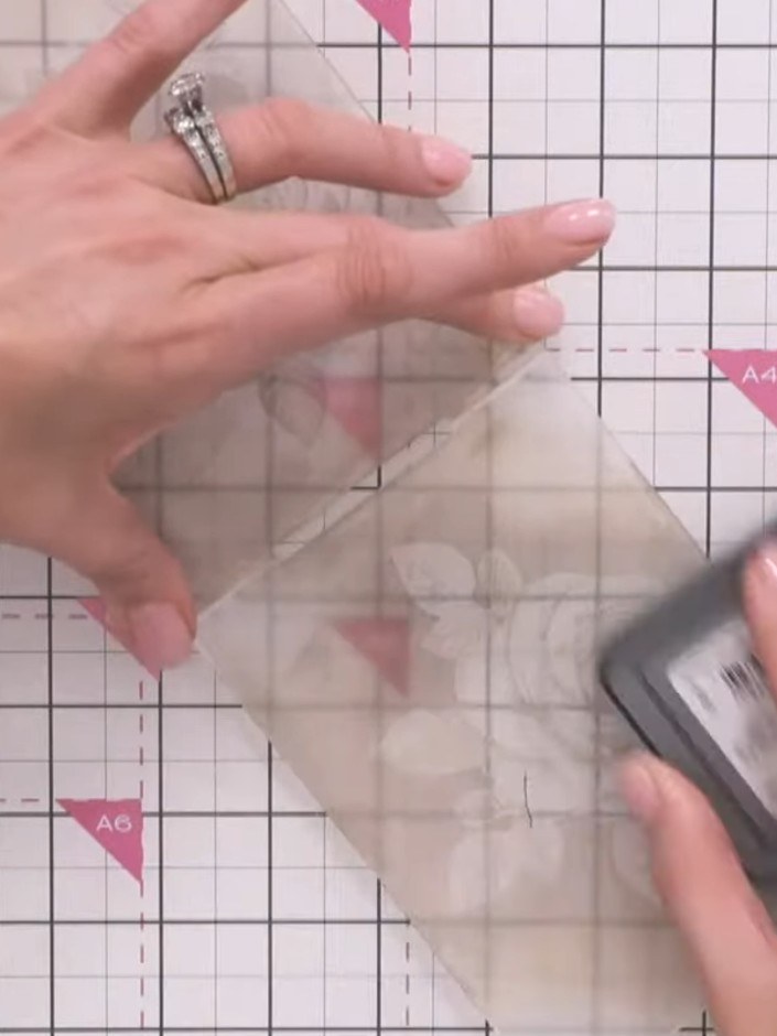 Step 4: Close the embossing folder and run it through your die-cutting machine using the appropriate embossing plates.