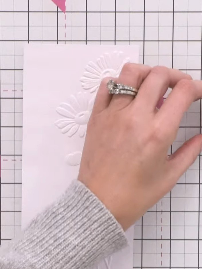 Step 4: Dilute a blue, purple or grey ink pad with water to create a very pale wash for shading the daisies.