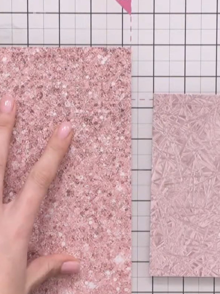 Step 1: Take an 8×8 inch piece of square paper and fold the bottom edge up to meet the top edge, creasing firmly with 