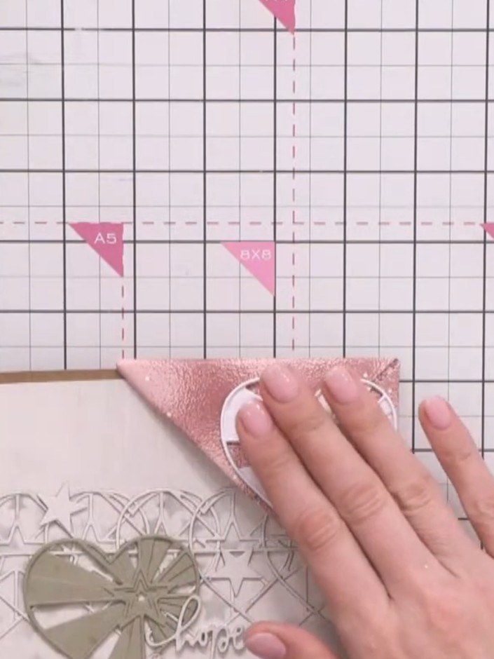 Step 13: Place the finished bookmark under a heavy weight, such as a book, to flatten and set all the layers. This will