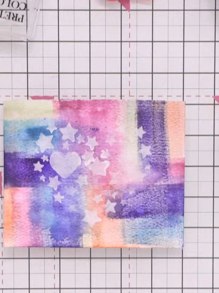 Aquarell-Karte mit Schablonen-Resist-Technik und ausgebleichten Sternen und Herzen - the finished project