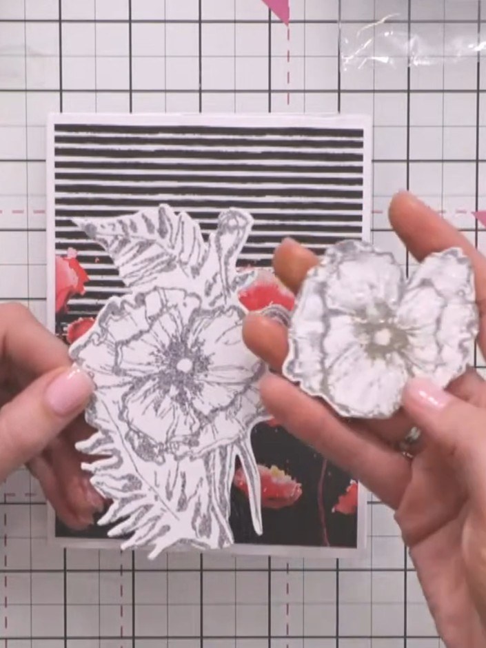 Step 2: Die-cut the embossed poppy design twice to create two identical flower pieces. Carefully remove the die-cut fl