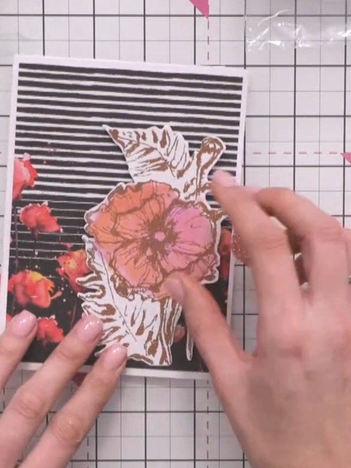 Step 5: Position the second poppy flower on top of the first, slightly offset and twisted to create a layered 3D effec