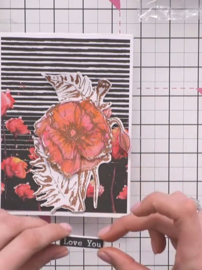 Step 8: Add a sentiment label to the bottom of the card to complete your layered 3D poppy flower card. Position it cen