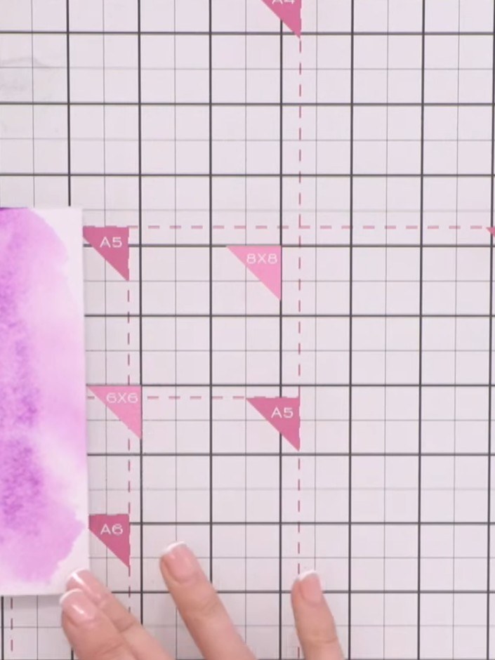 Step 3: Drop purple ink onto the wet card and allow it to spread naturally. Remove any excess ink with a tissue and co