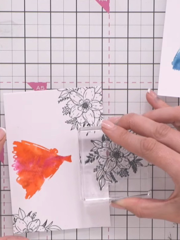 Step 10: Stamp a sentiment onto the card using black ink. Mount the watercoloured dress panel onto your card blank, pos