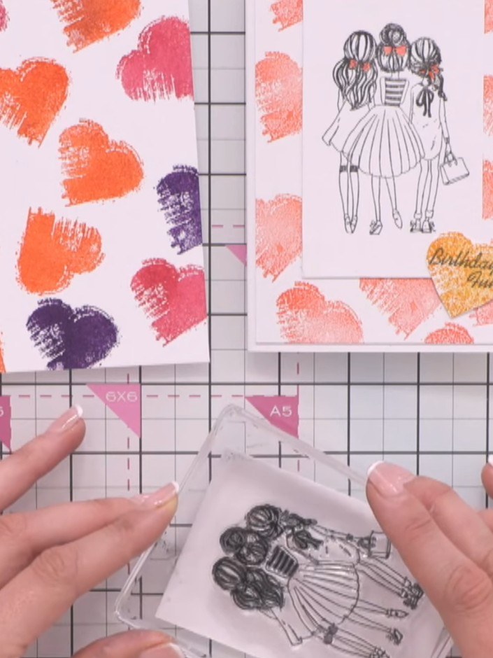 Step 7: Optionally add a touch of coordinating ink to the stamped girls' hair using your chosen colours. This adds a p