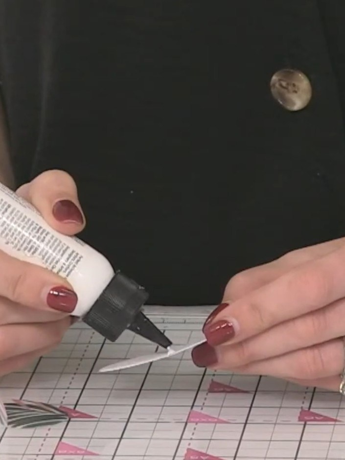 Step 5: Apply glue down the centre of the white card heart. Allow the glue to become tacky before adhering the pieces 