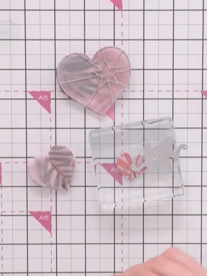 Step 2: Cut your patterned paper to size. Use scissors to tear the edges of the paper, creating texture and a vintage 