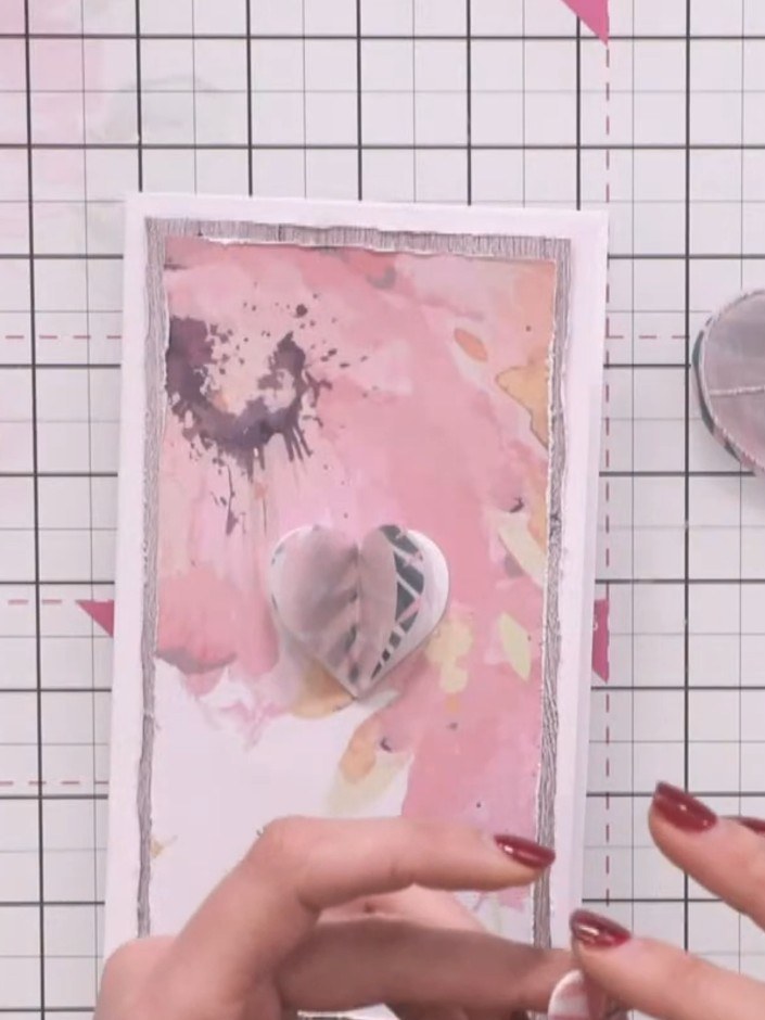 Step 7: Pinch and manipulate the heart layers between your fingers to create dimension. This will make them pop up pro