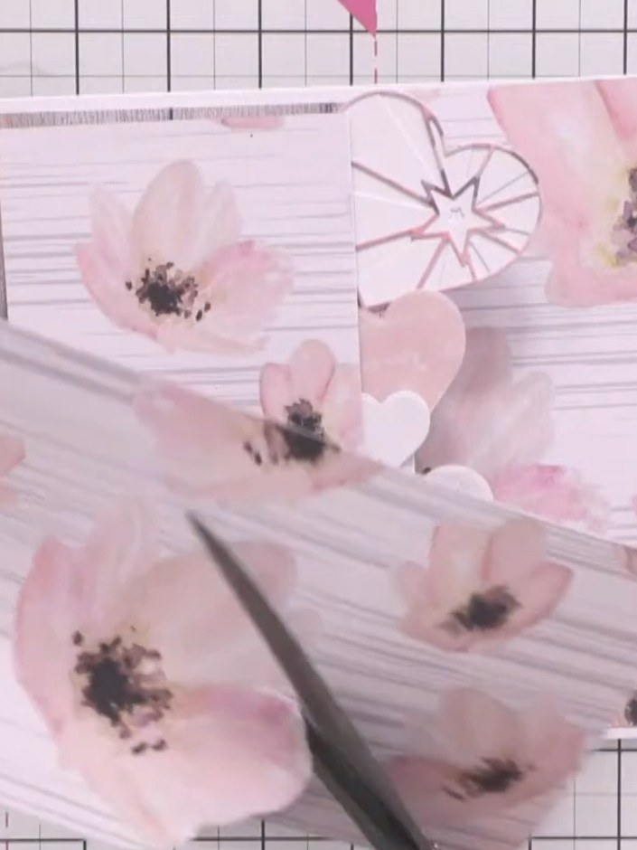 Step 1: Cut a piece of floral patterned paper from the paper pad and layer it onto your card base. Position the paper 
