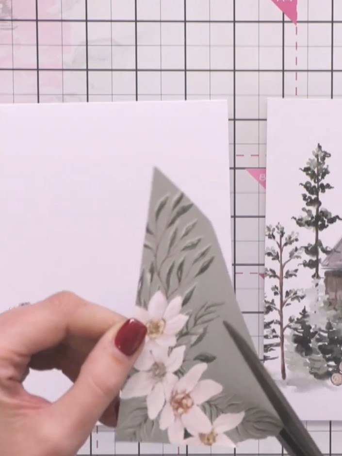 Step 2: Cut a sheet of patterned paper from your kit. Fussy-cut loosely around the detailed floral design, keeping cur