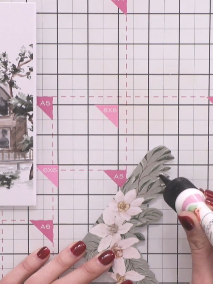 Step 6: Apply colourless glitter to the greenery elements on the card using a glitter glue pen. Avoid applying glitter