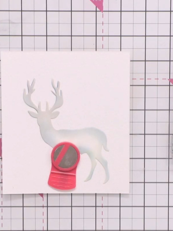 Step 4: Stamp tree designs around the stag using espresso ink. Press firmly to ensure clear impressions around the ele
