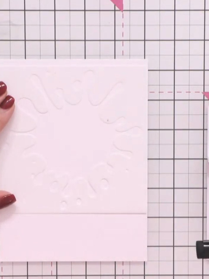 Step 3: Apply Tiffany ink around the edges of the splat shape using a blending tool. Blend the colours together to cre