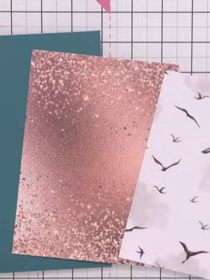 Step 1: Gather your green card blank, pink glitter cardstock, and patterned paper with bird design from the Cotton Pin