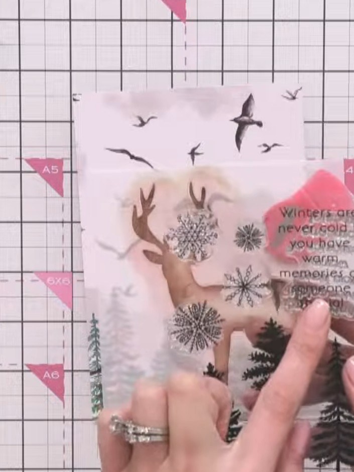Step 6: Stamp sentiment text from the collection inside the stag outline using light-coloured ink to create textured d