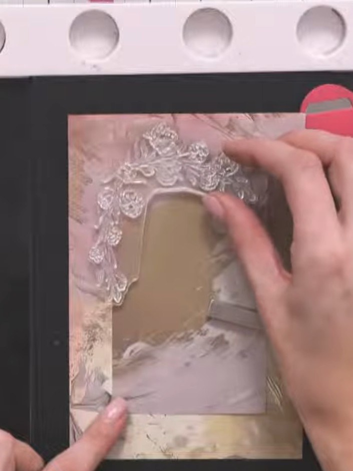 Step 5: Sprinkle gold embossing powder over the stamped cotton flower design, ensuring all the stamped areas are cover