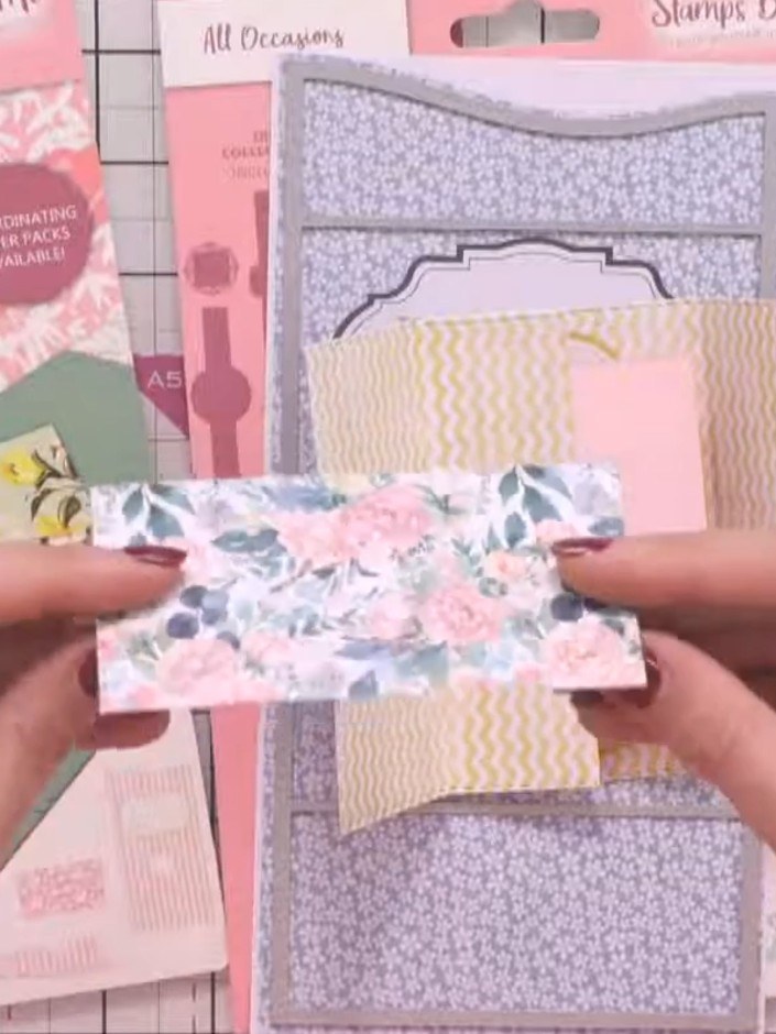 Step 3: Insert your gift card into the slot on the pop-up mechanism so it sits securely in the recessed area. The flor
