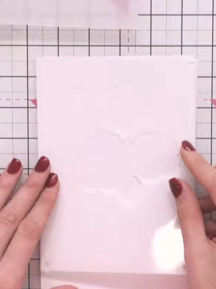 Step 2: Apply ink through the stencil using a light tapping motion. Remove the stencil carefully to reveal the first l