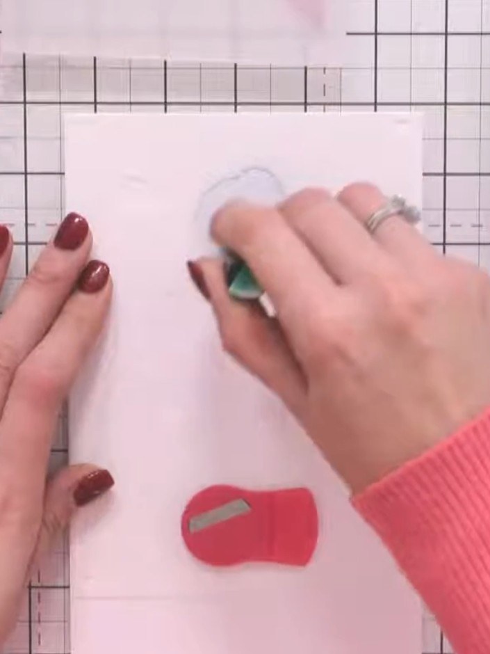 Step 3: Position the second layering stencil (numbered 2) over your card, aligning the registration hearts with your p