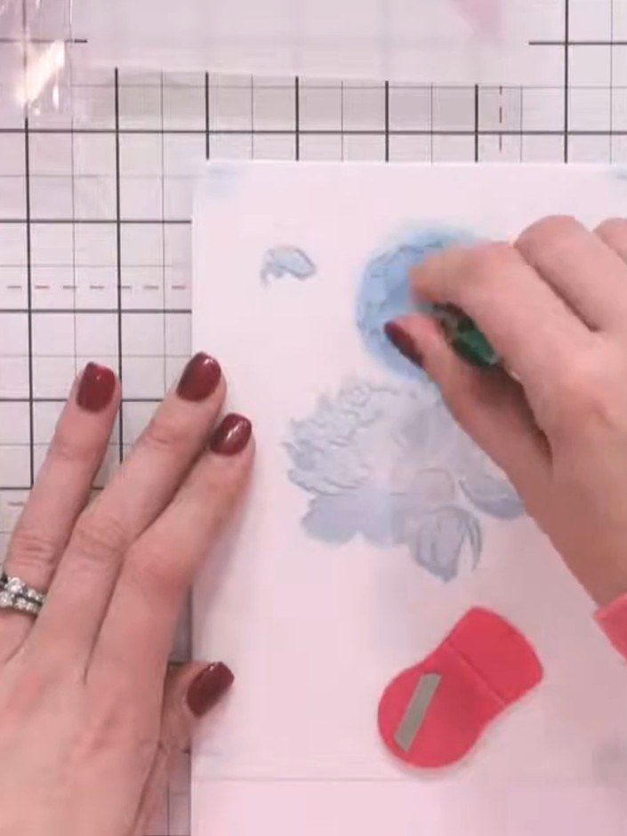 Step 4: Position the third layering stencil (numbered 3) over your stamped image and apply green ink to the foliage ar