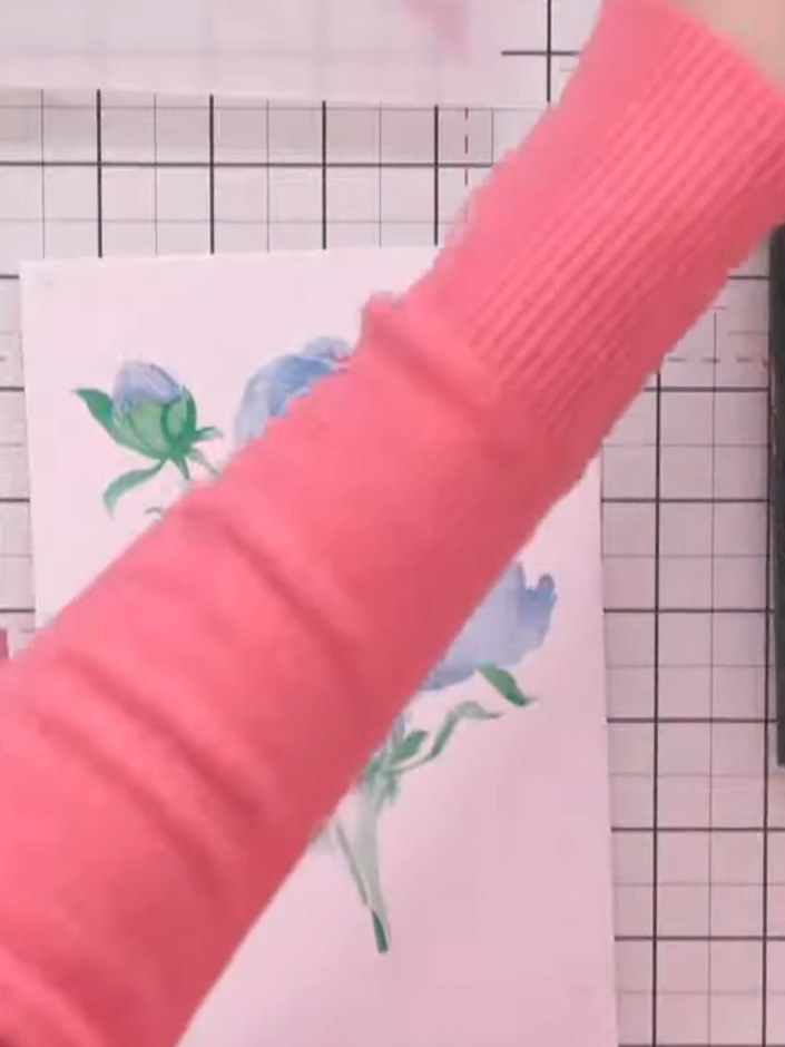 Step 6: Stamp the peony outline onto your layered stencilled design using a clear or sticky ink pad. Position the stam