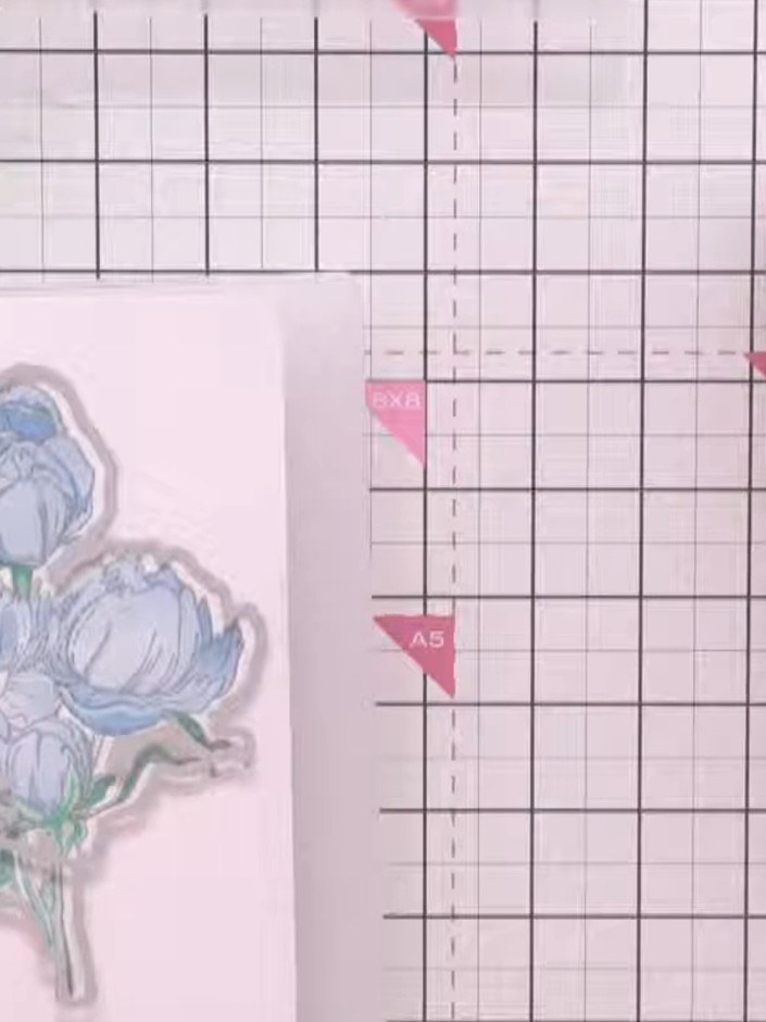 Step 8: Die-cut around the embossed flower design using the coordinating die from the Stamps by Me Quattro D Peonies s