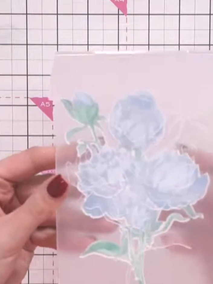 Step 9: Place the die-cut peony flower into the 3D embossing folder, ensuring it lines up correctly. The folder will o