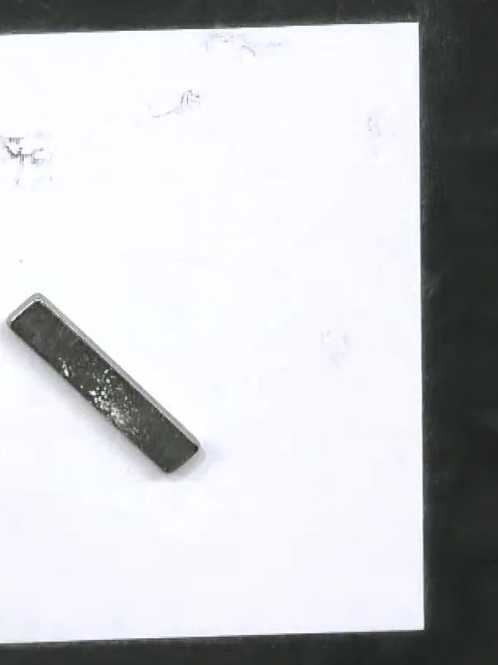 Step 2: Apply sticky ink to your bat stamp and stamp it twice onto the white card to capture all the detail of the ima