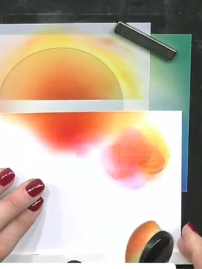 Step 4: Add pink or red ink to the centre of the sunset area to create depth and warmth. Blend the ink gently into the