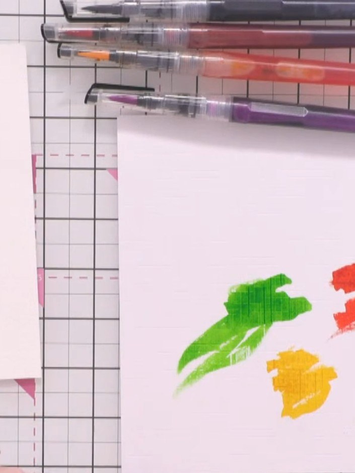 Step 1: Wet your watercolour card evenly with clean water using a brush, ensuring complete coverage across the surface