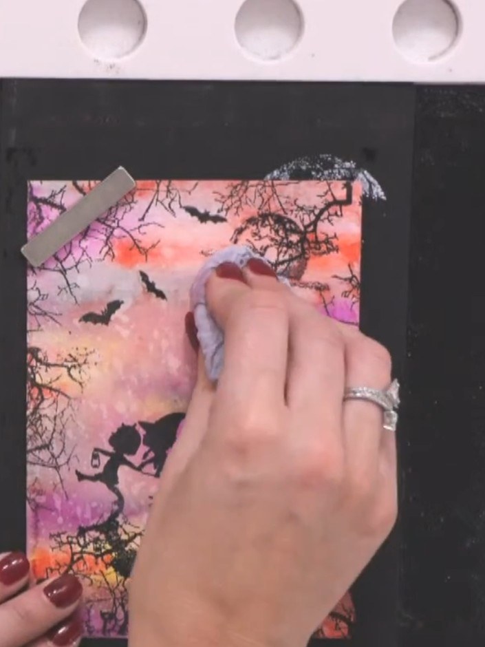 Step 15: Use a white gel pen to add highlights to the tops of all elements. Add highlights to the tree tops, children's