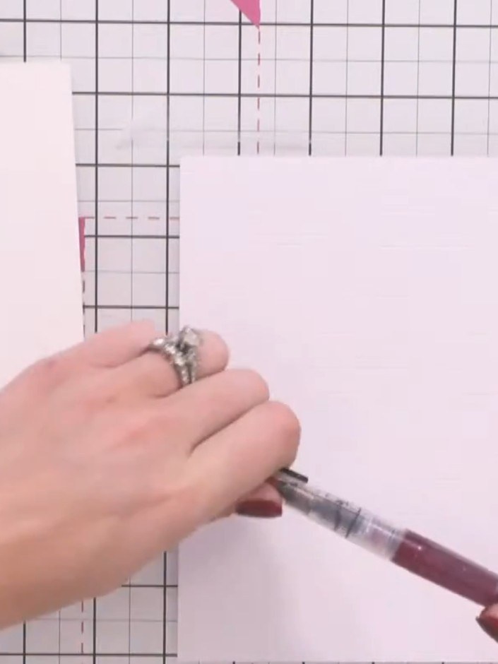 Step 4: Spray the card with clean water using a water brush or spray bottle. This will help the ink colours blend and 