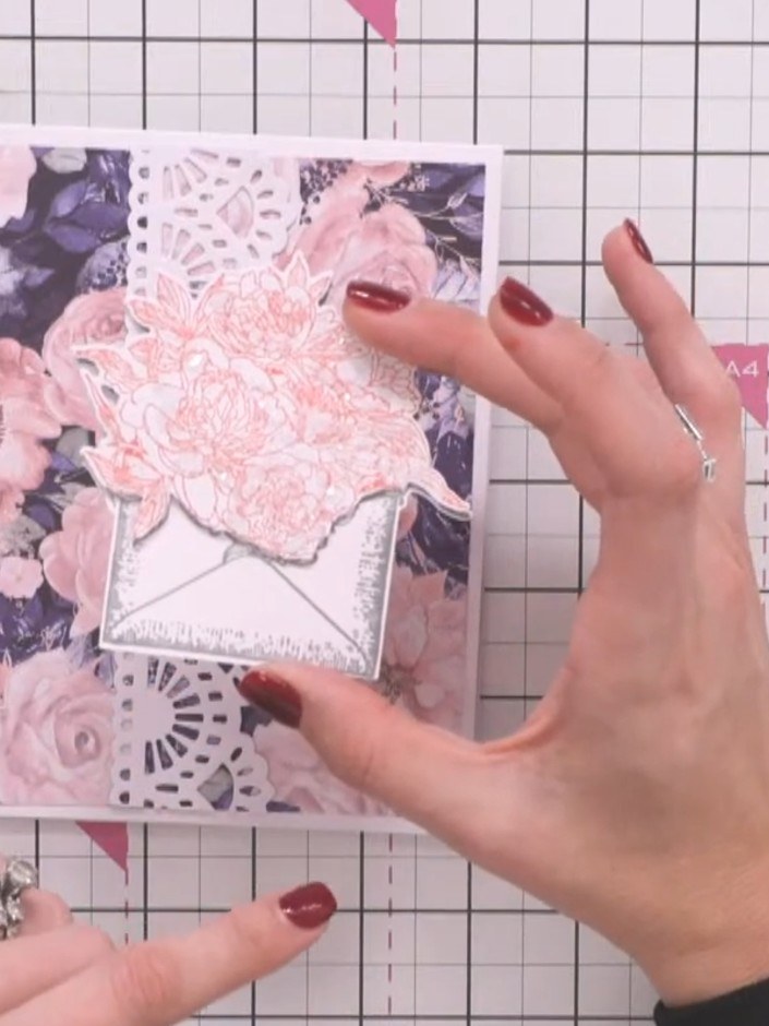Step 6: Add sparkle embellishments to the floral bouquet on your card. Position them amongst the flowers to add dimens