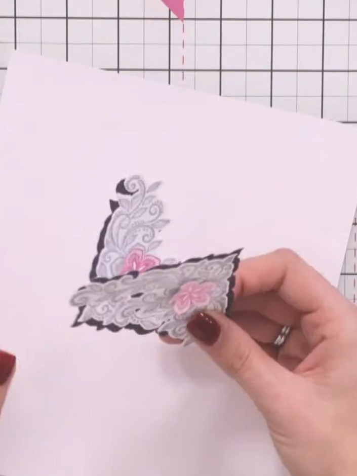 Step 5: Stamp the decorative corner design again onto white cardstock. Fussy cut around just the pink flowers and grey