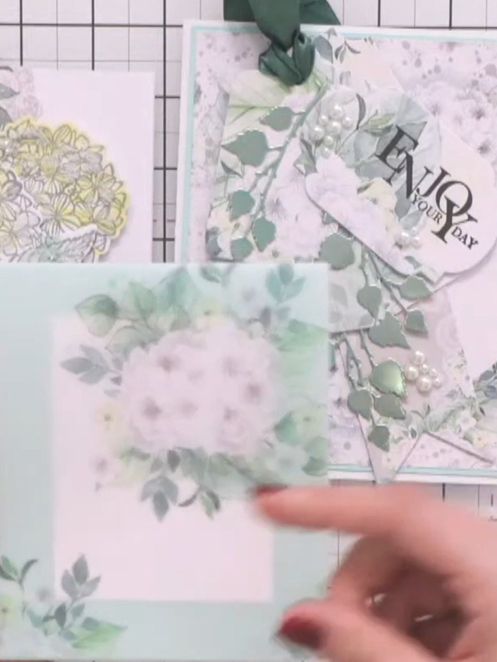 Step 1: Create a card base from green cardstock. Fold the card base in half to create a top-folding card.
