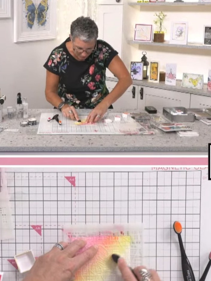 Step 3: Ink the same stamp with orange ink and stamp it below or slightly overlapping the first pink impression on the