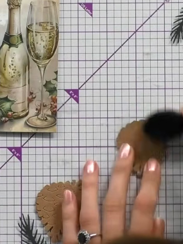 Step 4: Ink the edges of your pine cone pieces using a vintage white ink pad or your chosen colour. Apply the ink to a