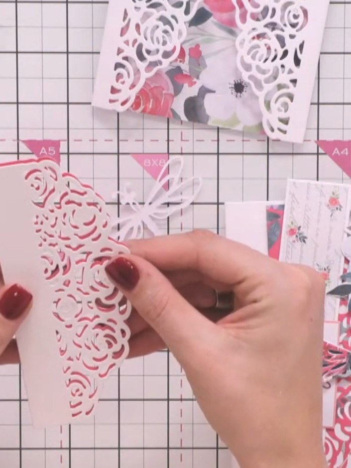 Step 2: Score along the inbuilt score line on the hinge of the decorative panel by gently pinching to create a fold. T