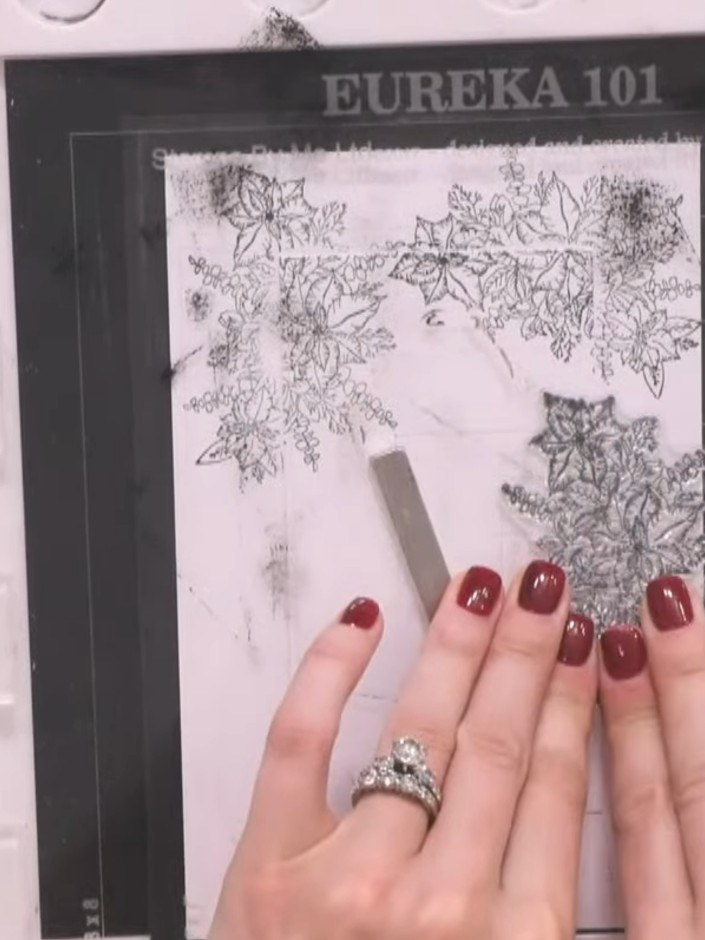 Step 7: Carefully remove the centre rectangular piece from the stamped panel to reveal the frame design with the snowf