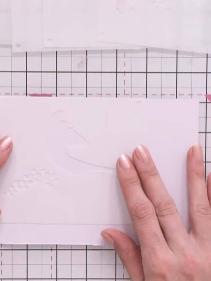Step 2: Position the first numbered stencil on your card base, aligning it with the edge of the page. Ensure the stenc