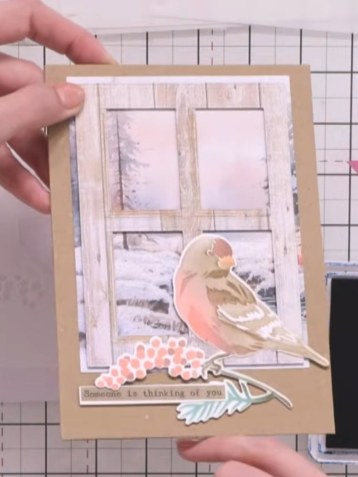 Step 3: Apply teal ink through the stencil using a brush to create the bird's body base layer. Use gentle circular mot