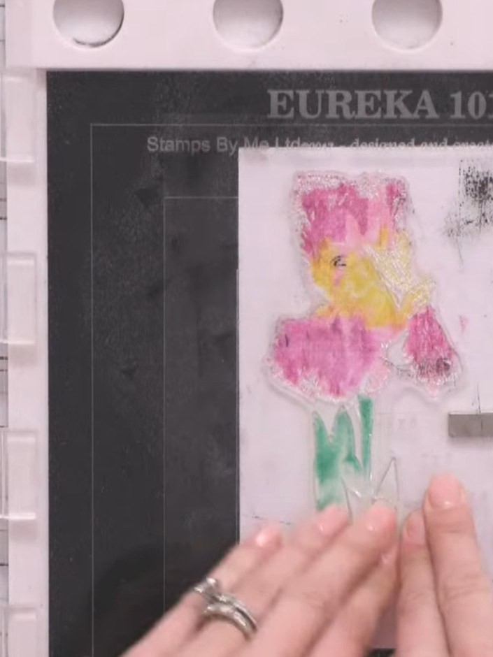 Step 4: Ink the bottom portion of the stamp (the stem and leaves) with green ink. Add darker green in some areas to cr