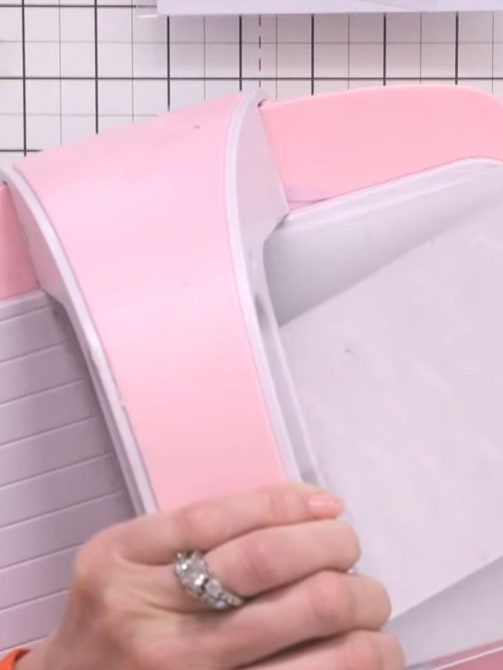 Step 3: Run the embossing folder with your cardstock through your die-cutting machine to create the embossed cloud tex