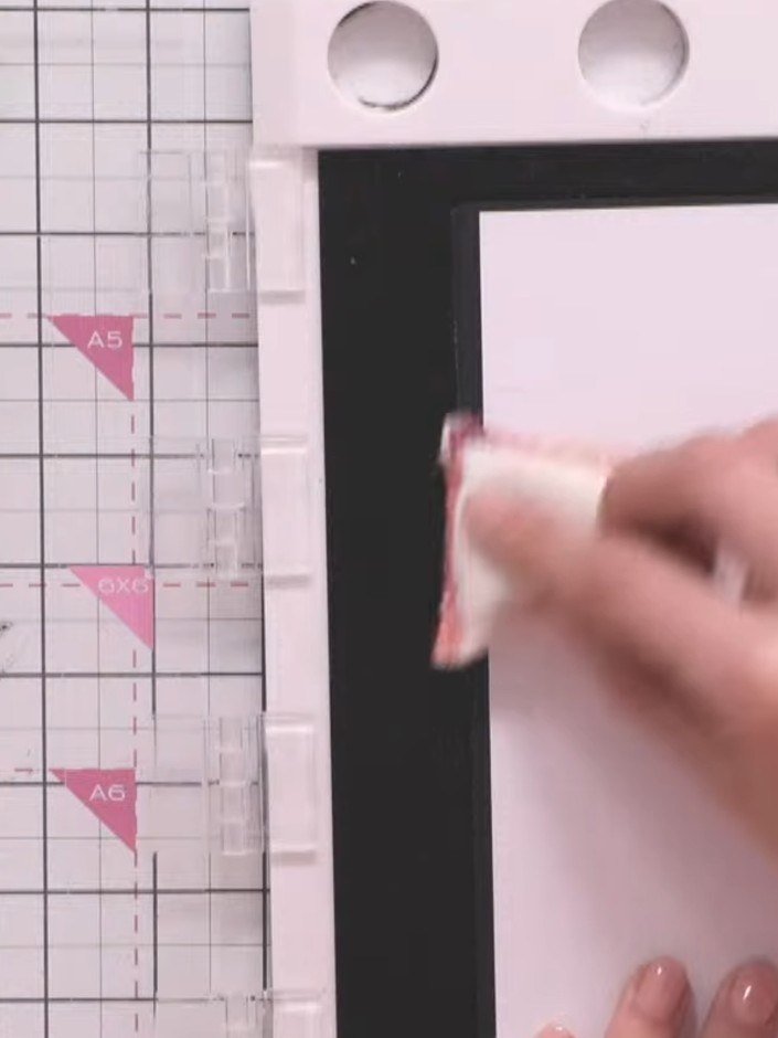 Step 2: Prepare your white card blank by wiping it with an anti-static powder tool or cloth. This prevents unwanted em
