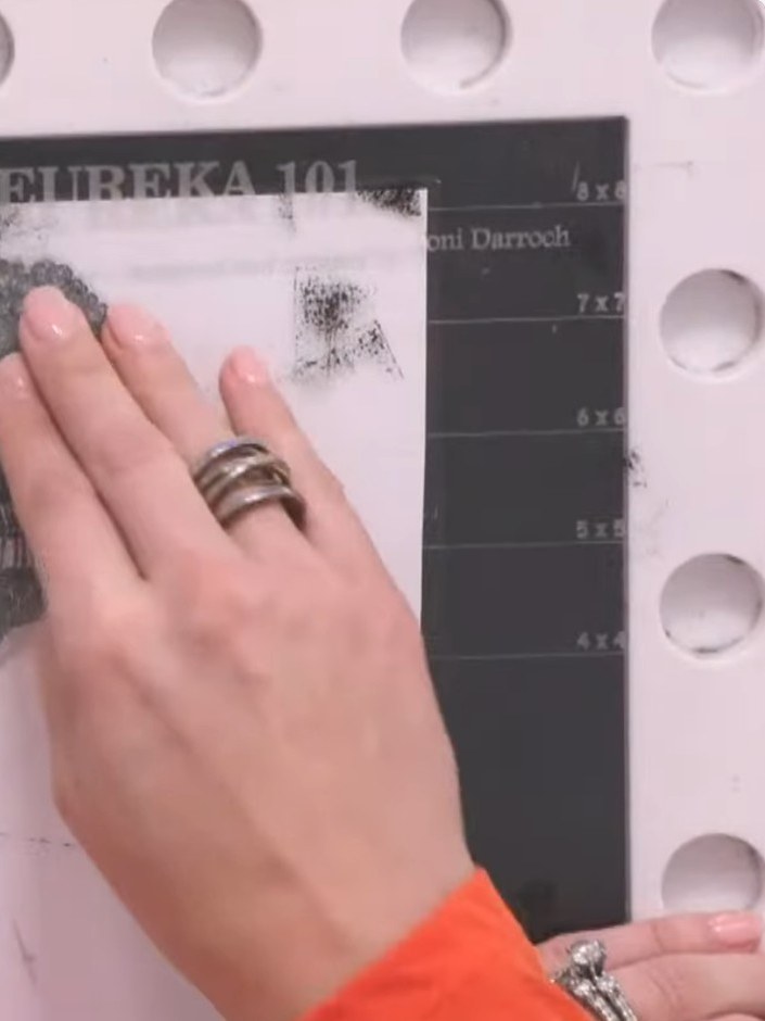 Step 4: Stamp the hot air balloon design onto the white card stock using the clear embossing ink pad. Press firmly and